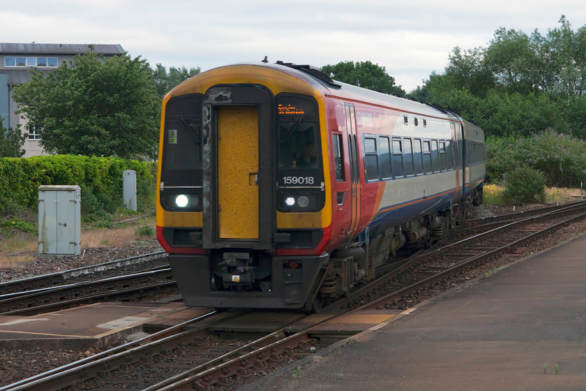 159018, SW 16.20 London Waterloo-Exeter St. David's (1L49, 12L), Exeter St. David's station 
 As the light begins to fail, 159018 arrives at Exeter St. David's station with the 16.20 from London Waterloo. The 159s (and their 158 cousins) have proved to be reliable and dependable units that have spent their life working the L & SW route and one or two others. I have found them to be comfortable and roomy trains with good seat to window alignment, a feature all too often not considered it seems. 
 Keywords: 159018 1L49 Exeter St. Davids station