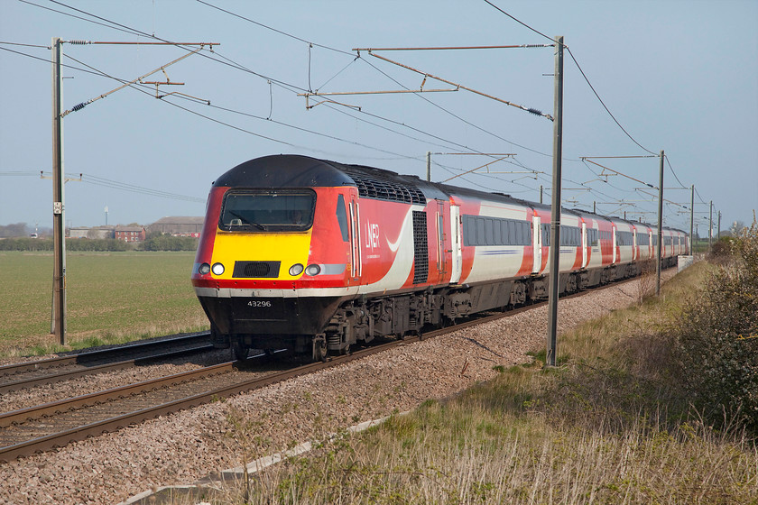 43296, GR 07.34 Harrogate-London King`s Cross (1A15, 3L), Frinkley Lane crossing SK906436 
 43296 (ex set 254021) storms past Frinkley Lane crossing leading the 07.34 Harrogate to King's Cross service. Frinkley Lane is between Grantham and Newark and is a great spot to appreciate the passing express train in full cry, something that this HST has done tens of thousands of times since its debut on the ECML in 1978. 
 Keywords: 43296 07.34 Harrogate-London King`s Cross 1A15 Frinkley Lane crossing SK906436