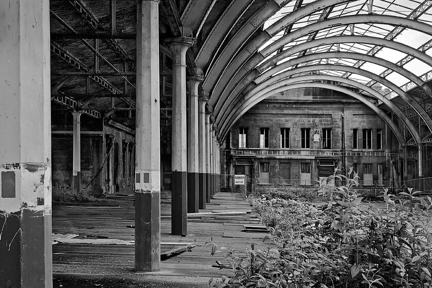 Platform 2, Bath Green Park station 
 Looking along the former platform 2 of Bath's Green Park station reveals a general state of decay and dereliction. Notice that the platforms at this end were of timber construction and in a pretty parlous state making me somewhat reluctant to walk on them! 
 Keywords: Platform 2 Bath Green Park station