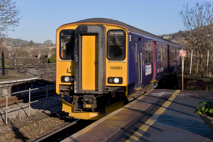 150261, GW 11.10 Weymouth-Bristol Temple Meads (2V90), Bath Spa station 
 150261 was named 'The Tarka Line, the first 25 years 19892014 ' in a ceremony at Barnstable station exactly a month ago to mark the twenty-fifth anniversary of the launch of the project that transformed the Barnstaple to Exeter line. It is seen arriving at Bath station wearing its vinyl 'nameplate' whilst working the 11.10 Weymouth to Bristol Temple Meads service. 
 Keywords: 150261 11.10 Weymouth-Bristol Temple Meads 2V90 Bath Spa station First Great Western The Tarka Line, the first 25 years 19892014