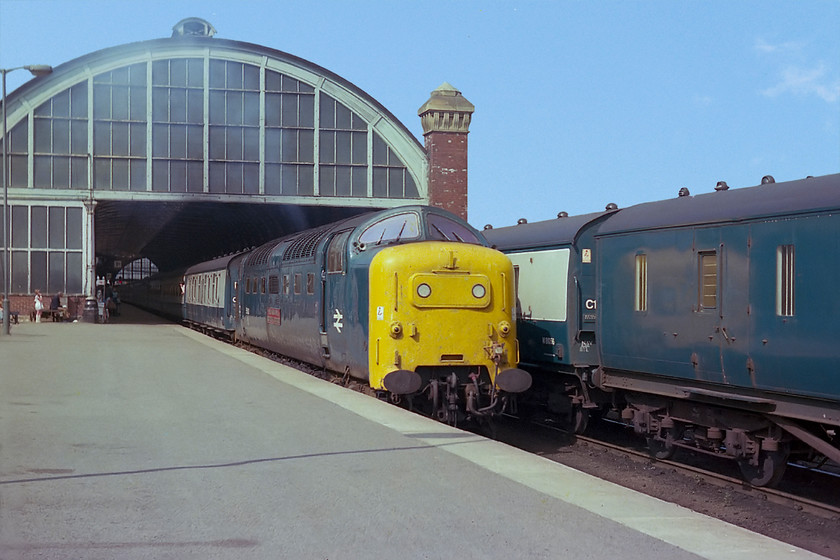 55010, 13.10 Edinburgh-London Kings Cross (1E13), Darlington station 
 The familiar view to the south of Darlington station sees 55010 'The King's Own Scottish Borderer' leaving with the 1E13 13.10 Edinburgh to King's Cross. Notice the LMS parcels van next to the train that is part of the stabled set of stock. In 2014 I stood at a very similar spot to photograph an East Coast service leaving the station with a Class 91 leading, see..... https://www.ontheupfast.com/p/21936chg/30018035744/x42-82230-gr-17-25-newcastle-london 
 Keywords: 55010, 13.10 Edinburgh-London Kings Cross (1E13), Darlington station