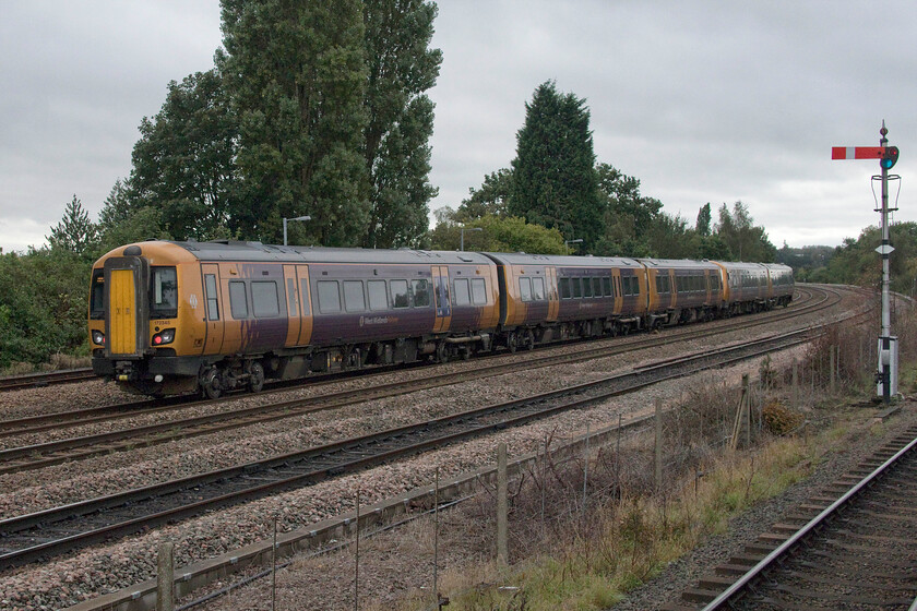 172345, 08.49 King's Norton-King's Norton (37E), Kidderminster 
 West Midlands Railway 172345 and another unit pass Kidderminster having not stopped at the station located just to my left working an unusual empty coaching stock move. The 08.49 King's Norton to Kings Norton working took a very long and convoluted route seemingly encompassing the entire West Midlands Trains' network! I am not at all sure as the purpose of this extravagant run unless anybody can advise. Notice the semaphore to the right that is controlled by the Severn Valley Railway's signal box. 
 Keywords: 172345 08.49 King's Norton-King's Norton Kidderminster