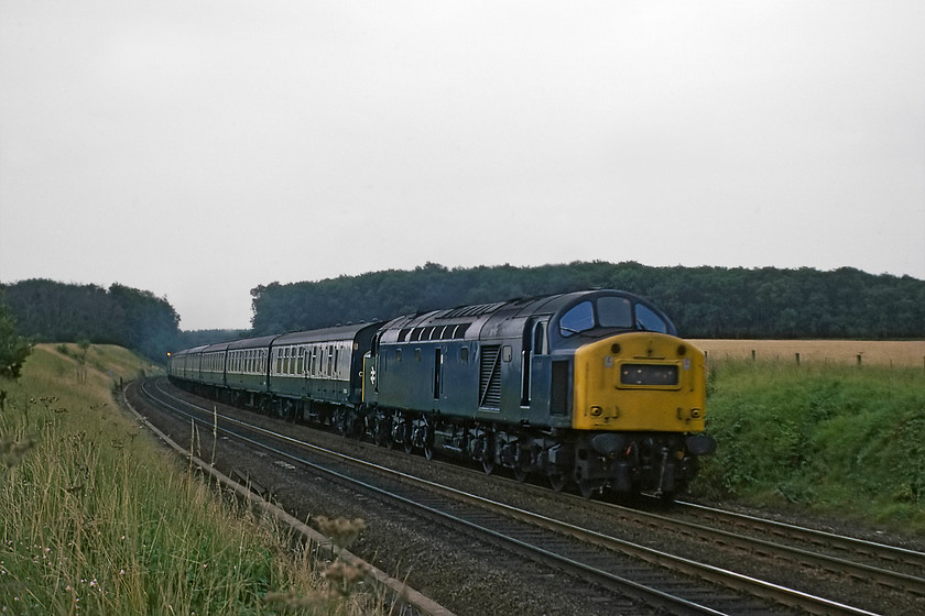 40148, down ECS, Barkston Junction SK912417 
 A photograph courtesy of Graham that has been rescued from his rejects bin shows 40148 leading, what we believe was a down ECS working of Mk. I stock. The train is seen heading north past Barkston Junction a short distance north of Grantham. 40148 survived another six years in-service before withdrawal and disposal at Doncaster. 
 Keywords: 40148 ECS Barkston Junction SK912417