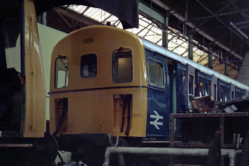 1313, undergoing overhaul, Swindon Works 
 Looking very smart approaching the end of its overhaul at Swindon Works is a class 207 East Sussex unit number 1313. The 207 had a different appearance from its class 206 and 204 cousins due to the rounded finish where the front panel meets the side panels and recessed jumper cables.