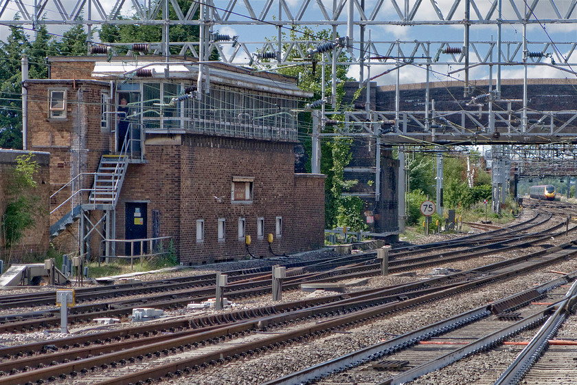 Stafford No. 5 signal box (BR, 1952) 
 With just three more weeks in operation Stafford No. 5 signal box stands guard to the north end of the station. The box is a large LMR Type 14 box dating from 1952 and contains a one hundred and fifty lever 'Derby' frame. It is one of the few grade seven boxes still in use but not for much longer. Notice the huge BR enamel running-in sign attached to the front of the box.

PS Unlike No. 4 signal box that was demolished withing six weeks of closure, the shell of No.5 languished on for some time finally being brought down during 2017 
 Keywords: Stafford No. 5 signal box 1952 Stafford Number 5 signal box