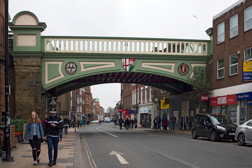 Worcester Foregate Street railway bridge 
 Looking down Foregate Street in Worcester at the 1860 GWR bridge. It has a had a lot of recent work carried out and has been tastefully restored. This was carried out by Network Rail in 2013 and cost over one million pounds!