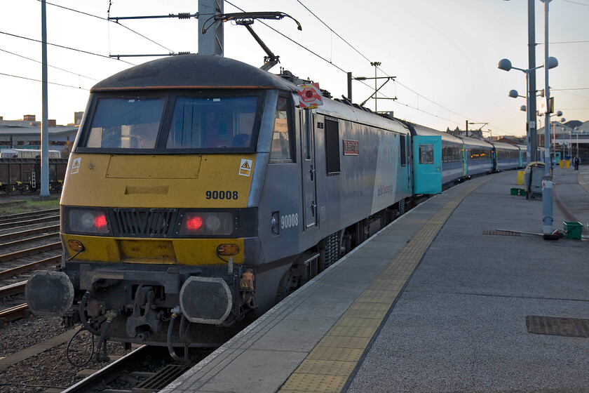 90008, LE for 16.30 Norwich-London Liverpool Street (1P53), Norwich station 
 With its red tail lights still illuminated after its recent arrival from London 90008 'The East Anglian' rests at the rear of the stock at Norwich station. In just less than half an hour it will leave with the 16.30 1P53 back to Liverpool Street. 
 Keywords: 90008 16.30 Norwich-London Liverpool Street 1P53 Norwich station The East Anglian