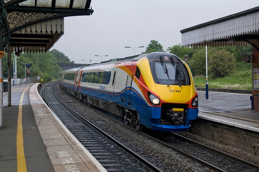 222004, EM 07.29 Sheffield-London St. Pancras (1C20), Wellingborough station 
 The 07.29 Sheffield to St. Pancras East Midlands Trains service passes through Wellingborough worked by 222004. Unfortunately, a wet and chilly May morning, weather that characterised the whole of our week away in York! 
 Keywords: 222004 07.29 Sheffield-London St. Pancras 1C20 Wellingborough station EMT East Midlands Trains Meridian