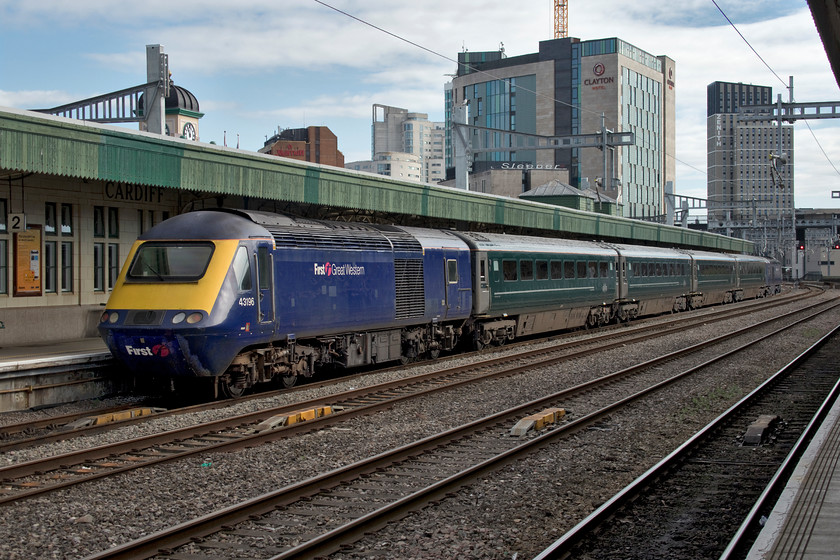 43196, GW 11.00 Cardiff Central-Taunton (2C73, 1E), Cardiff Central station 
 The environment around Cardiff Central station is changing at an astonishing rate with new blocks and flats going up at an incredible speed. This is a reflection of the general growth of Cardiff as a whole. With Central station a little dwarfed by two new hotel blocks to the east, 43196 sits at the rear of the 11.00 to Taunton. It's a little surprising that the power car is still wearing the First Great Western branding as a new operator usually changes the vinyls pretty rapidly when they take over the franchise 
 Keywords: 43196 11.00 Cardiff Central-Taunton 2C73 Cardiff Central station