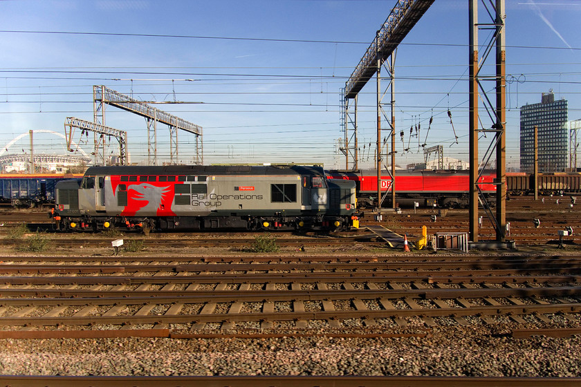 37601 & 66124, stabled, Wembley yard 
 Passing Wembley yard in glorious sun sees 37601'Perseus' stabled with 66124 behind. The ROG operated class 37 looks very smart in its livery that keeps these evergreen veterans of the network looking good. 
 Keywords: 37601 66124 Wembley yard