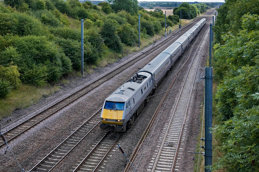 91107, GR 11.00 London King's Cross-Edinburgh Waverley (1S13), Westby SK962271 
 Since I last photographed 91107 'Skyfall' back in April at Edinburgh it has lost its Skyfall vinyls and now has a proper nameplate mounted in the conventional position. It is seen passing near the village of Westby working East Coast's 11.00 King's Cross to Edinburgh service a train. 
 Keywords: 91107 11.00 London King's Cross-Edinburgh Waverley 1S13 Westby SK962271 East Coast IC225 Skyfall