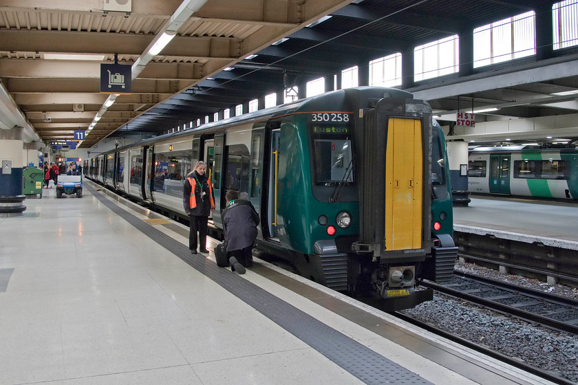 350258, LN 08.33 Birmingham New Street-London Euston, ran as 10.08 Northampton-London Euston (1W06, 17L), London Euston station 
 My wife and I travelled on 350258 from Northampton to Euston and the train is seen at platform eleven after arrival. However, things did not go to plan due to more London NorthWestern 'operational difficulties'. The in-coming 08.33 Birmingham New Street to Euston, that we should have caught, was mysteriously cancelled somewhere before Northampton. Therefore, the next arrival into the station from the south was terminated and immediately worked back south again, in this case as the re-timed 10.08 to Euston meaning that arrived seventeen minutes late. 
 Keywords: 350258 08.33 Birmingham New Street-London Euston 10.08 Northampton-London Euston 1W06 London Euston station Desiro London Northwestern railway delay repay late