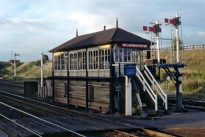 Wellingborough Station Signal Box (MR, 1893) 
 The superb Wellingborough Station signal box sits between the fast and slow lines to the northern end of the station. It was a Midland Type 2b box opened in 1893 replacing an earlier structure the other side of the fast lines to my left. The box survived until 05.12.87 when signalling was passed to Leicester PSB. By a complete irony, this was the same week that I attended an interview in Wellingborough for a job that I secured, a day that shaped the next forty years or so of my life with me moving to Northamptonshire from my beloved Wiltshire. 
 Keywords: Wellingborough Station Signal Box