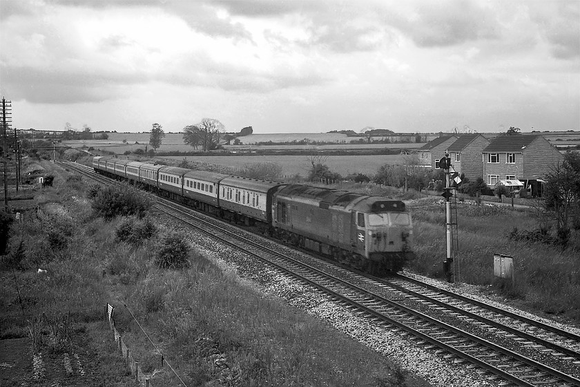 50008, 13.45 Paignton-London Paddington (1A03), Paul`s Bridge, Somerton ST482280 
 50008 'Thunderer' approaches Somerton from the west with 1A03 13.45 Paignton to Paddington service. The photograph is taken from Paul's bridge where the B3165 leaves the village. The flatish land to the left and the fact that the telegraph wires are set so far away from the line suggest previous railway use, perhaps sidings of some kind; can anybody advise? 
 Keywords: 50008 13.45 Paignton-Paddington 1A03 Paul`s Bridge Somerton ST482280 Thunderer