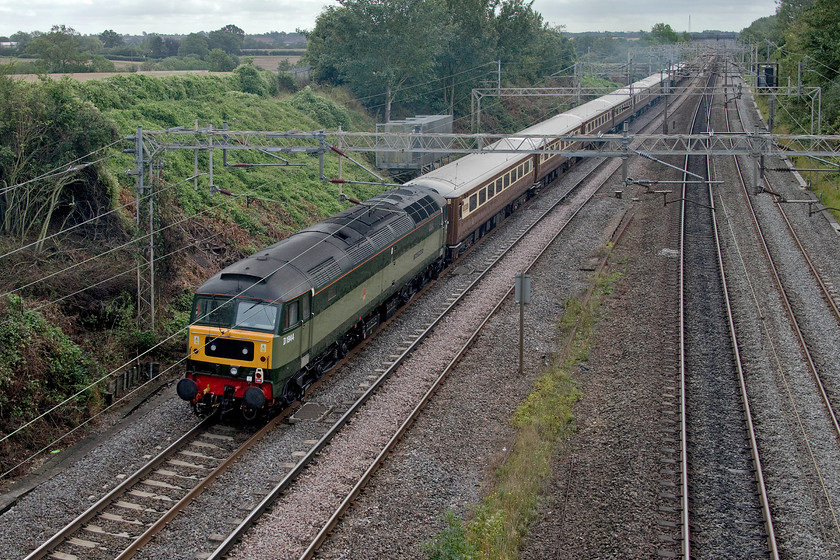 D1944, outward leg of the Royal Windsor Statesman, 06.23 Preston-Windsor & Eton Riverside (1Z85), Victoria bridge 
 With 47614 hauling the train up at the front, the Royal Windsor railtour heads past Victoria bridge on the WCML just south of Roade with D1944 'Craftsman' at the rear. This class 47 was painted into its British Railways two-tone green livery in the summer of 2016 and was named at the DRS open day, see.... https://www.ontheupfast.com/v/photos/21936chg/25724353204/d1944-47501-drs-gresty-bridge 
 Keywords: D1944 Royal Windsor Statesman 06.23 Preston-Windsor & Eton Riverside 1Z85 Victoria bridge