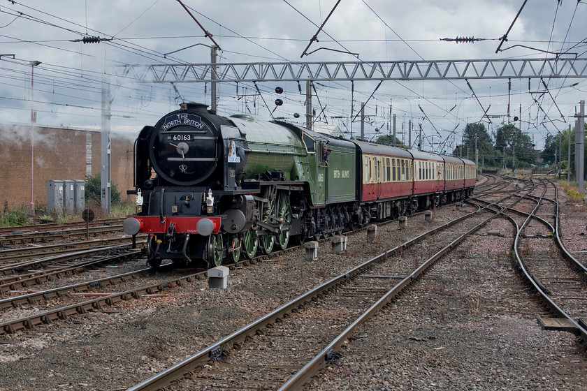 60163, outward leg of The North Briton, 08.16 London King`s Cross-Carlisle (1Z50), Carlisle station 
 Completing its outward journey, 60163 'Tornado' arrives at Carlisle having left King's Cross at 08.16 leading The North Briton running as 1Z50. It had travelled via the ECML as far as Doncaster then to Leeds and over the Settle and Carlisle. Amongst the passengers were four friends and former work colleagues who had boarded the train at Peterborough. They reported that they had had a smashing trip and that they had been well looked after by the UK Railtours team. 
 Keywords: 60163 The North Briton 08.16 London King`s Cross-Carlisle 1Z50 Carlisle station