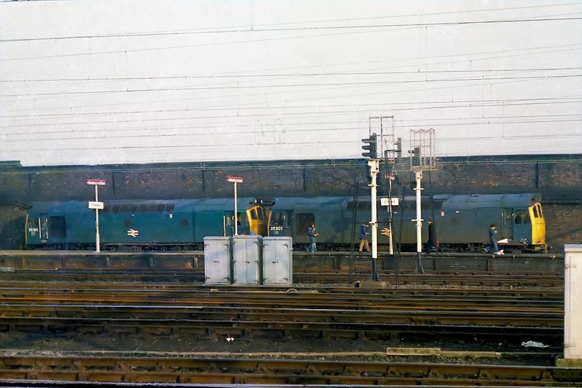 25184 & 25207,LEs, Crewe station 
 24184 and 25207 paired up sit over on the far side of Crewe station. They arrived light engine, spent a few minutes at the platform and then headed off south. 
 Keywords: 24184 24207 Crewe