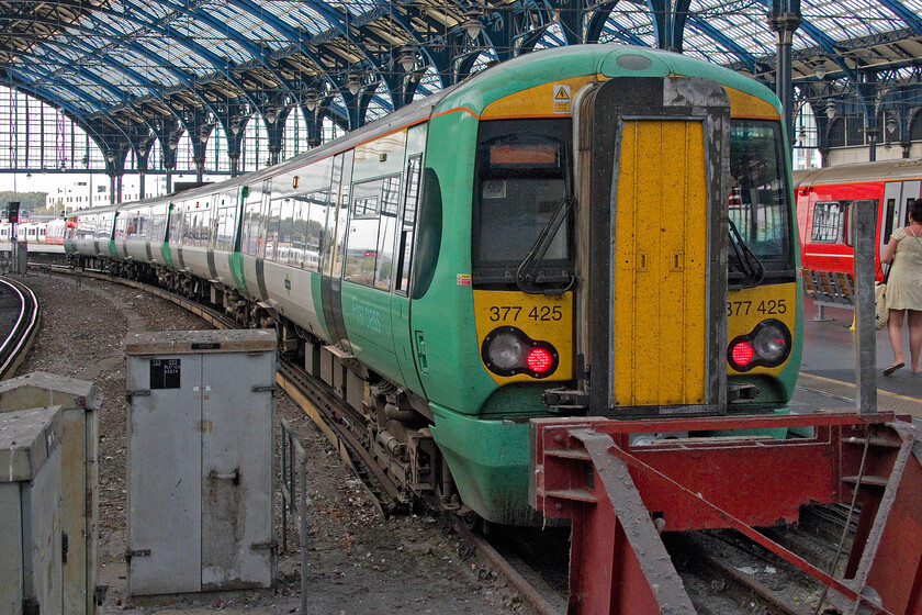 377425, SN 16.28 Southampton Central-Brighton (1N29, 2L), Brighton station 
 My last train of the day of my short return run from Brighton to Littlehampton after arrival back at my starting point. 377425 rest on the blocks at Brighton having arrived with the 16.28 service from Southampton Central. Following an incident on board the train that necessitated the police being called two passengers were detained after allighting. Once this was sorted out and the platform cleared the train would depart returning west to Portsmouth. 
 Keywords: 377425 16.28 Southampton Central-Brighton 1N29 Brighton station Sothern Electrostar