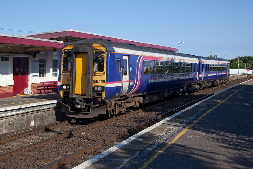 156450, SR 09.00 Girvan-Ayr (1A57, RT), Girvan station 
 Having run up from Ayr, 156450 terminated at Girvan. After a quick change of ends, a PN break for the driver and the train is ready to return as the 09.00 departure back to Ayr. The train was pleasingly busy for an off-peak working. This train, as are all on this line, is supported by The Stranraer to Ayr Line Support Association. This has become an important association who work hard to keep the line going given that the ferry terminal at Stranraer closed in 2011 causing a reduction in train services. 
 Keywords: 156450, 1A57 Girvan station