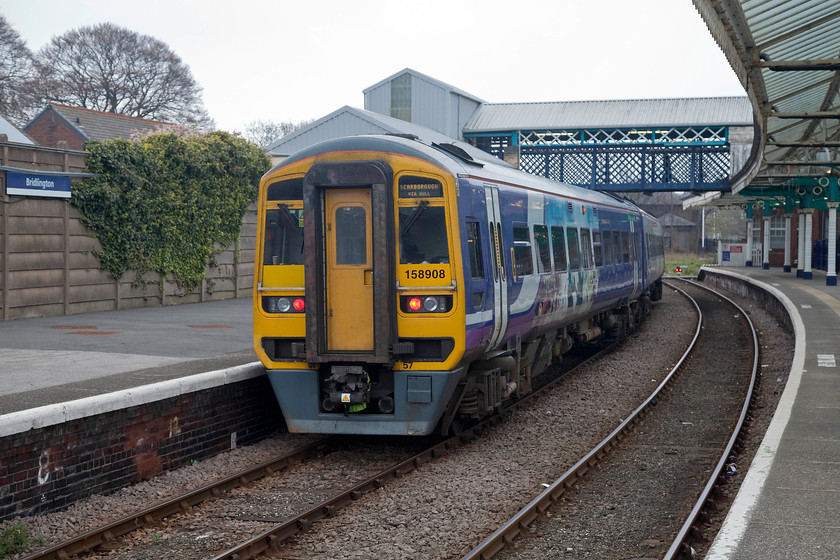 158908, NT 13.24 Sheffield-Scarborough (1W46,1L), Bridlington station 
 Northern's 158908 pauses at Bridlington station whilst working the 13.24 Sheffield to Scarborough. This platform and side of the station is not so attractive as the central covered part as seen in the previous picture. The nasty footbridge roof and lift tower is also a blot on the otherwise Victorian station landscape. 
 Keywords: 158908 13.24 Sheffield-Scarborough 1W46 Bridlington station