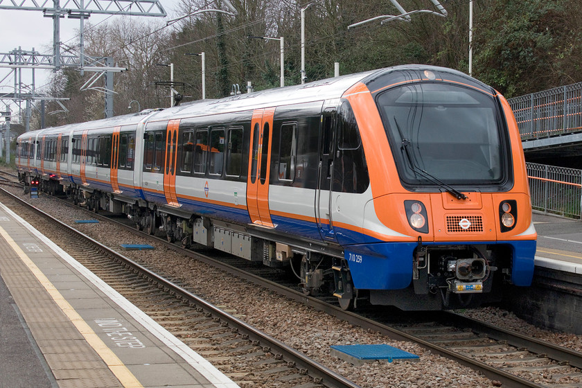 710259, LO 13.25 Gospel Oak-South Tottenham (2J35, RT), Upper Holloway station 
 Recent electrification and brand new stock now feature on the Gospel Oak to Barking North London line that had always been a bit of a railway backwater. At Upper Holloway, the 13.25 Gospel Oak to South Tottenham shuttle service arrives formed by a smart-looking 710259. The line was only partially open with trains terminating at and starting from South Tottenham due to a lengthy closure of the lines caused by a freight train derailment last month, see.... https://www.networkrailmediacentre.co.uk/news/gospel-oak-to-barking-line-freight-derailment 
 Keywords: 710259 13.25 Gospel Oak-South Tottenham 2J35 Upper Holloway station London Overground