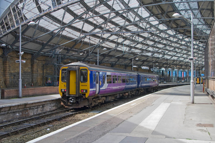 156428, NT 11.44 Manchester Oxford Road-Liverpool Lime Street (2F99), Liverpool Lime Street station 
 156428 coasts into Liverpool Lime Street's platform nine with the 11.44 Northern Trains service from Manchester Oxford Road. It is services such as this that will go over to electric in the coming few years as the electrification is completed and new stock is introduced. I wonder if it will be completed on time? 
 Keywords: 156428 11.44 Manchester Oxford Road-Liverpool Lime Street 2F99 Liverpool Lime Street Northern Trains Sprinter