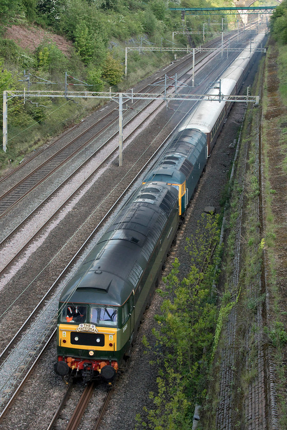 D1924 & 47614, the outward leg of The Canterbury & White Cliffs Statesman, 06.36 Shrewsbury-Canterbury West (1Z85), Roade cutting 
 I was fully expecting that The Canterbury and White Cliffs Statesman railtour was going to be top and tailed so to see it double headed was a treat! D1924 (formally DRS 47810) is paired with 47614 working the railtour that started out from Shrewsbury at 06.36 and was heading for Canterbury West and is seen passing through Roade Cutting. This gave the passengers only a couple of hours to explore the delightful Kent city before returning. I observed the return working from the bedroom window of home at about 21.00! 
 Keywords: D1924 47614 The Canterbury & White Cliffs Statesman 06.36 Shrewsbury-Canterbury West 1Z85 Roade cutting