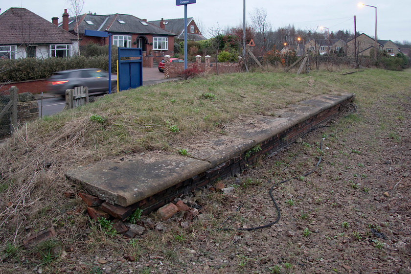 Former platform, Silkstone station (now Silkstone Common) 
 In the half-light at Silkstone Common station the remains of the old platform can be seen. This remnant of the old station, simply named Silkstone, was opened by the Manchester, Sheffield and Lincolnshire Railway in 1855. It closed in 1959 to be re-opened by BR in 1983 at its new location just east of this spot. The old station building is still extant as a private residence named, appropriately, 'Station House' 
 Keywords: Silkstone station Silkstone Common