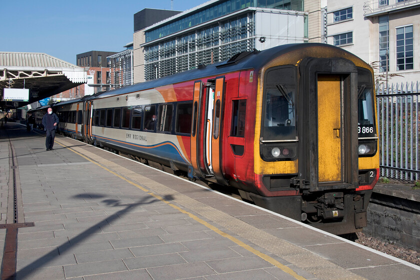 158866, EM 07.38 Manchester Oxford Road-Norwich (1L05, RT), Nottingham station 
 Our second train of four on this lovely warm early spring day waits at Nottingham station. We took 158866 as far as Grantham where we were able to pick up an East Coast LNER service. This 1L05 EMR service started from Manchester Oxford Road at 07.38 rather than the timetabled Warrington Central. It arrived at Manchester as an empty stock working from Stockport that itself should have gone to Warrington so something had obviously gone awry! 
 Keywords: 158866 07.38 Manchester Oxford Road-Norwich 1L05 Nottingham station EMR East Midlands Railway