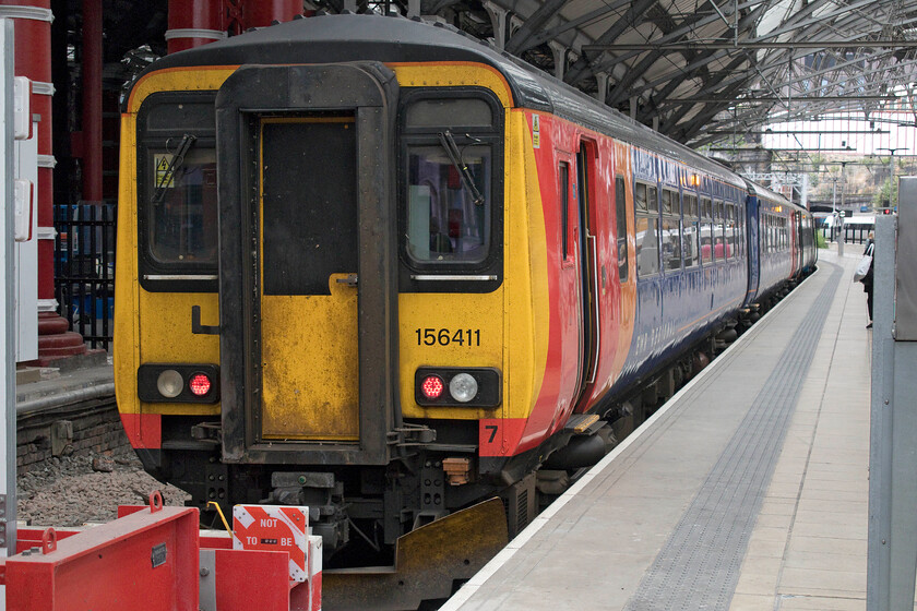 156411, EM 11.50 Liverpool Lime Street-Norwich (1L11, 3L), Liverpool Lime Street station 
 Whilst the Class 156 Super Sprinter that dates from 1988 has proved an enduring design I am not at all sure that I would want to travel in one across virtually the entire width of the country? 156411 sits at the back of another unit at Liverpool Lime Street waiting to work the 1L11 11.50 service to Norwich with a journey time of almost exactly six hours! 
 Keywords: 156411 11.50 Liverpool Lime Street-Norwich 1L11 Liverpool Lime Street station EMR East Midlands Railway