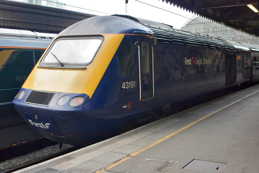 43191 GW 09.30 Penzance-London Paddington (1A82, 4L), London Paddington station 
 Having brought up the tail of the 09.30 Penzance to London Paddington, 43191 takes a breath for half an hour or so before it works west again as the 16.04 return to Penzance. It's pretty incredible that these forty year old veterans of the main line are still capable of such demanding diagrams. 43191 was a power car of one of the very last HSTs put into service as 253055 in the summer of 1982. 
 Keywords: 43191 1A82 London Paddington station