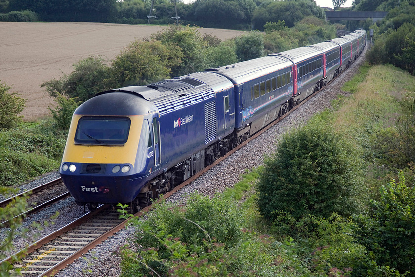 43015 & 43143, GW 12.56 Penzance-London Paddington (1A90, 2L), Berkley ST802494 
 43015 and 43143 pass the tiny village of Berkley just outside Frome working the 12.56 Penzance to London Paddington. In recent years, the banks have been cleared by Network Rail at this spot and others in the vicinity. But, as can be seen in this shot, it is beginning to grow back again. 
 Keywords: 43015 43143 1A90 Berkley ST802494