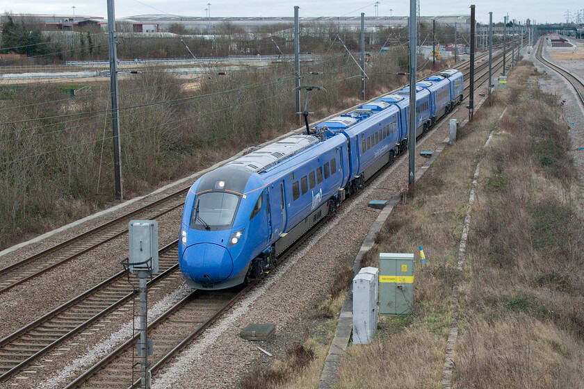 803005, LD 10.45 London King's Cross-Edinburgh (1S93, RT), Marholm TF154036 
 We are sold the idea that the few open-access operators are small independent companies running services and challenging the big boys in the best spirit of private enterprise; don't believe it! Beginning its operations in the pandemic ravaged year of 2021 LUMO is not actually independent but part of the giant First Group who is the largest operator on the UK network with seven franchises including one of the other open-access ones operating on the ECML, Hull Trains. Grand Central is the third open-access operator on the ECML and is, again, not independent being owned by Arriva that has reduced its operations on the UK network in recent years having fallen out with the Department for Transport now only running Chiltern (until the end of 2023) and CrossCountry. My first photograph of a LUMO service sees 803005 passing Marholm working the 1S93 10.45 King's Cross to Edinburgh service. 
 Keywords: 803005 10.45 London King's Cross-Edinburgh 1S93 Marholm TF154036 LUMO