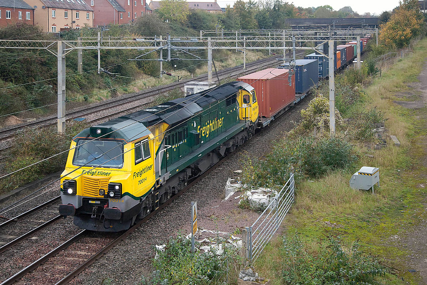 70014, 03.35 Garston FLT-London Gateway (4L52), site of Roade station 
 Making a heck of a racket, as the class 70s do, 70014 passes the site of Roade station leading the 4L52 03.35 Garston to London Gateway Freightliner. 
 Keywords: 70014 03.35 Garston FLT-London Gateway 4L52 site of Roade station