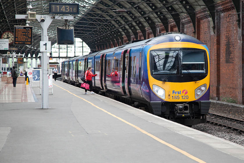 185120, TP 11.10 Newcastle-Liverpool Lime Street (1F67), Darlington station 
 TPE 185120 pauses under Darlington's grand train shed with the 11.10 Newcastle to Liverpool Lime Street. I really like Darlington station, it's well maintained and has a nice atmosphere. It's a shame that the dreaded barriers have been installed. 
 Keywords: 185120 11.10 Newcastle-Liverpool Lime Street 1F67 Darlington station