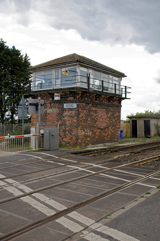 Greatham signal box (NE, 1899) 
 Greatham is a small village located midway between Hartlepool and Billingham. The signal box is located at the end of a long lane from the village that led to the now-closed Cerebos (later owned by Sharwoods of curry fame) salt factory. Consequently, the level crossing now sees very little traffic. The box is a classic NER box with its characteristic hipped roof dating from 1899. It is due for closure in the next few years as the Durham Coast route is modernised by Network Rail. 
 Keywords: Greatham signal box North Eastern Railway