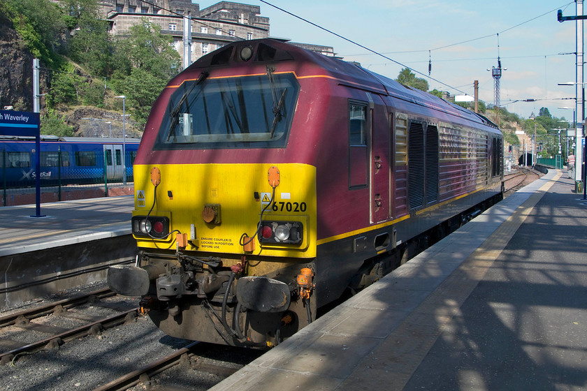 67020, stabled, Edinburgh Waverley station 
 Unlike the WCML that uses Class 57s the East Coast uses Class 67s as their thunderbird rescue locomotives. 67020 sits in one of Edinburgh Waverley's bay platforms awaiting the call from control to rescue an errant HST or an IC225 set, hopefully, not many such calls come through! 
 Keywords: 67020 Edinburgh Waverley station Thunderbird