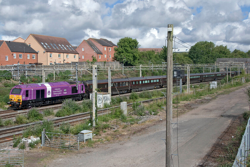 67007, 08.48 Wolverton Centre Sidings-Scotland (1Z64), site of Roade station 
 With two dedicated Class 67s available to haul the Royal Train (67005 'Queen's Messenger' and 67006 'Royal Sovereign') somebody decided that the recently repainted 67007 should operate the train on this occasion! Close examination of the rather garish locomotive here seen at the rear of the train, with 67006 hauling out of sight on the front, reveals the Royal crest and the words 'Celebrating Queen Elizabeth II Platinum Jubilee 1952-2022'. The train was running empty to Scotland to collect the Royals and to then take them to King's Lynn the next day for their summer break at Sandringham. Running as 1Z64 I was not able to ascertain where exactly in Scotland the train was heading with no published information and a dearth of posts from observers! 
 Keywords: 67007 08.48 Wolverton Centre Sidings-Scotland 1Z64 site of Roade station