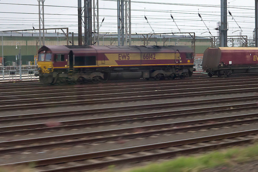 66142, stabled, Wembley Yard 
 66142 stabled in Wembley Yard taken from our passing train. 
 Keywords: 66142 stabled Wembley Yard