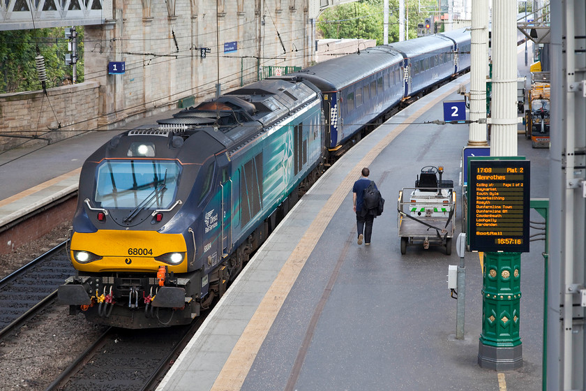 68004, SR 15.00 Motherwell TMD-Edinburgh Waverley ECS (5G13), Edinburgh Waverley station 
 To satisfy capacity needs ScotRail are still operating their Fife Circle locomotive-hauled services, something that they have done for some years. Now operated by the new class 68s rather than the 67s and 37s of the past, the 15.00 Motherwell to Edinburgh ECS arrives into Waverley's platform two. Hauled by 68004 'Rapid', the train has taken a circuitous route from the Glasgow depot using the Edinburgh freight only avoiding line that travels through the south of the city. 
 Keywords: 68004 15.00 Motherwell TMD-Edinburgh Waverley ECS 5G13 Edinburgh Waverley station