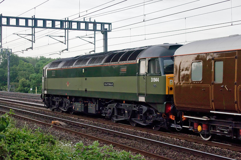 D1944, outward leg of The Settle and Carlisle Coastal Statesman, 05.42 Milton Keynes Central-Appleby (1Z25), Ashton Road bridge 
 D1944 'Craftsman' brings up the rear of The Settle and Carlisle Coastal Stateman railtour booked as the 1Z25 05.42 Milton Keynes to Appleby. The last time that I saw this locomotive was at the 2016 Gresty Bridge open day where it was unveiled in this retro. green livery and named, see ..... https://www.ontheupfast.com/v/photos/21936chg/25724353204/d1944-47501-drs-gresty-bridge 
 Keywords: D1944 The Settle and Carlisle Coastal Statesman 05.42 Milton Keynes Central-Appleby 1Z25 Ashton Road bridge