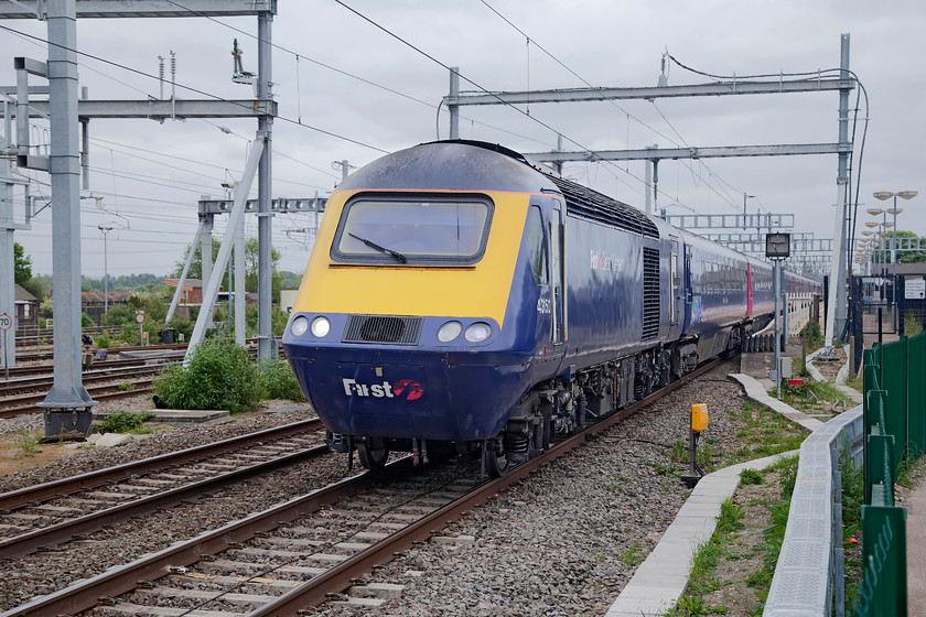 43150, GW 12.56 London Paddington-Cardiff Central (1B31, 7L), Didcot Parkway station 
 43150 leaves Didcot Parkway at the front of the 12.56 Paddington to Cardiff Central. It won't be long before these veterans of the GWML will be taken out of front-line service and will no longer be seen on express' such as this. 43150 was one of the power cars of set 253040 as part of a third batch of HST delivered to the Western region during 1981. 
 Keywords: 43150 1B31 Didcot Parkway station