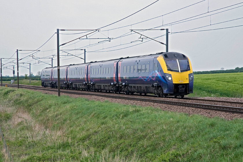 180109, HT 14.35 Hull-London King's Cross (1A94), Frinkley Lane crossing SK906436 
 180109 works Hull Trains' 14.35 Hull to King's Cross service past Frinkley Lane. Hull Trains have used a variety of stock on their services, usually cast-offs from other operators and the use of the Adelantes is no exception. They have not been the most successful of trains with the fourteen sets beset with reliability issues throughout. 
 Keywords: 180109 14.35 Hull-London King's Cross 1A94 Frinkley Lane crossing SK906436 Hull Trains Adelante