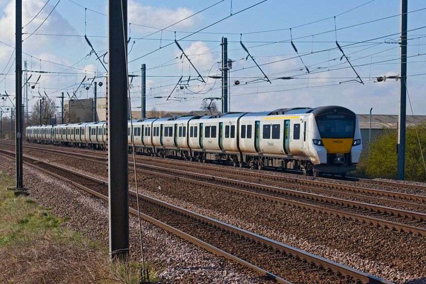 700122, TL 07.55 Horsham-Peterborough (from Three Bridges) (9J18, 2E), Sandy TL176510 
 Something had obviously gone wrong earlier in the morning with this Thameslink service as 700122 did not actually commence its journey from Horsham at 07.55 as planned. It actually started from Three Bridges to then run through (or actually under to be precise) Central London arriving at Peterborough two minutes early. With the clouds gathering it was time to get back in the trusty Combo van and make for home complete with a sofa attached to the roof bars that is! 
 Keywords: 700122 07.55 Horsham-Peterborough from Three Bridges 9J18 Sandy TL176510 Thameslink