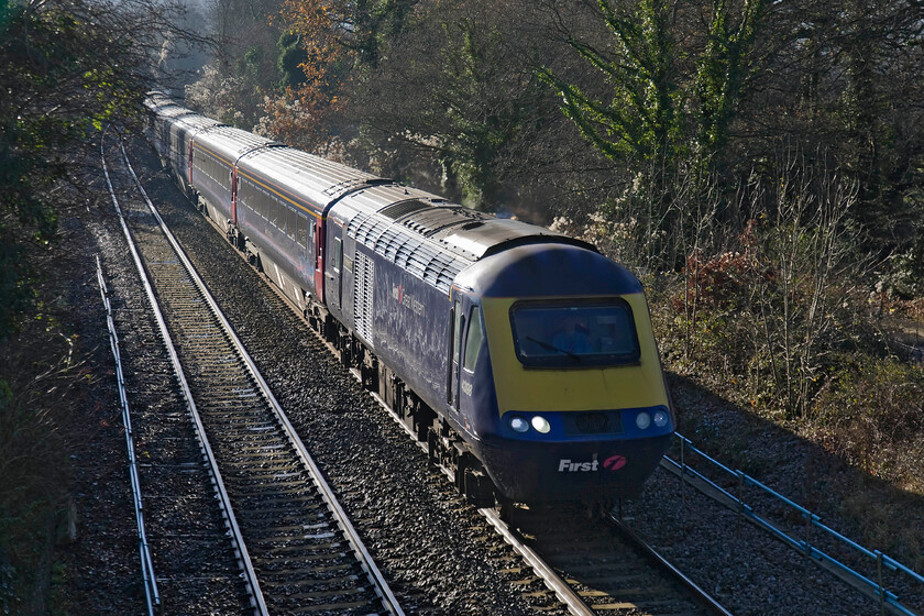 43198, GW 12.30 Bristol Temple Meads-London Paddington (1A17), Middlehill footbridge ST805680 
 Last numbered 43198 'Oxfordshire 2007' leads the 1A17 12.30 Bristol to Paddington FGW service on the climb from Bathampton to Box tunnel. It is about to pass under Middlehill footbridge. Whilst not a fan of 'glint shots' I quite like the winter back lighting of this photograph. 
 Keywords: 43198 12.30 Bristol Temple Meads-London Paddington 1A17 Middlehill footbridge ST805680 Oxfordshire 2007