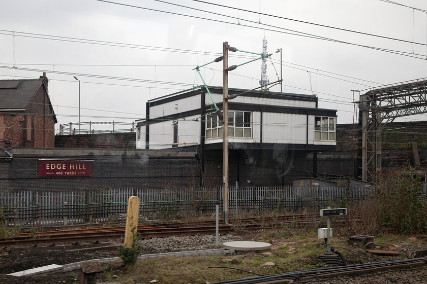 Edge Hill Signal Box (BR, 1961) 
 Two remarkable survivors at Edge Hill just outside Liverpool. Firstly, the BR built 1961 signal box and secondly, the huge BR (LM) enamel sign that has been a notable feature here for many years. 
 Keywords: Edge Hill Signal Box