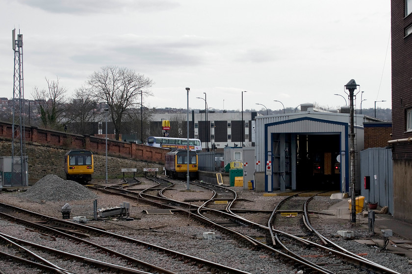 142084, 142023 & 153351, stabled, Sheffield depot (Fish Dock) 
 At the southern end of Sheffield station is a small maintenance facility in an area known as the Fish Dock. From left to right is one carriage of 142084 that obviously has a problem. In the middle is 142023 and hiding in the depths of the small shed is 153351. When the new stock is introduced over the coming months, will this spell the end of this particular facility? 
 Keywords: 142084 142023 153351 stabled Sheffield depot Fish Dock