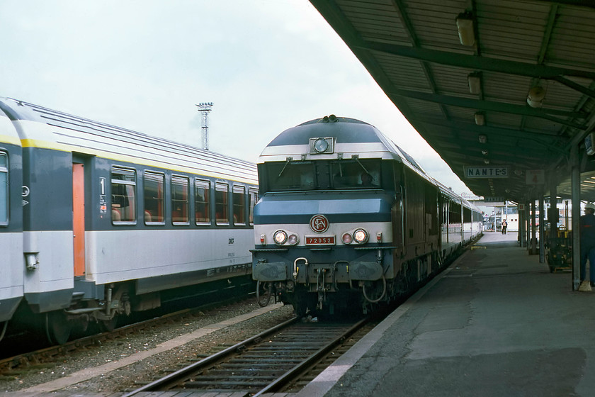 72052, working from Paris, Nantes station 
 92 of these CC72000 were built for SNCF by Alsthom between 1967 and 1974, so, when this picture was taken at Nantes station 72052 was quite new. It is seen arriving at platform four with a working from Paris. The bulk of these locomotives is exaggerated at stations due to the low platforms on the French railway network. 
 Keywords: 72052 Nantes station