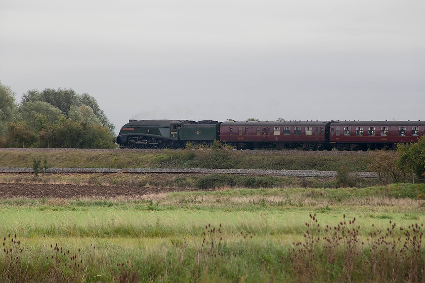 60009, outward leg of The Yorkshireman, 06.31 London Victoria-York (1Z60), Radwell Viaduct TL008569 
 60009 'Union of South Africa' is almost at walking pace as it approaches Sharnbrook Junction against adverse signals. This is a shame and will make things more difficult for the crew as they will have to work hard to get it going up to the summit even though the gradients on the slow are not quite so steep. It is leading the outward leg of the 06.31 Victoria to York running as 1Z60. 
 Keywords: 60009 The Yorkshireman 06.31 London Victoria-York 1Z60 Radwell Viaduct TL008569