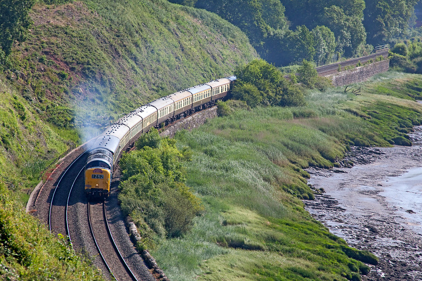 55009, outward leg of The Welsh Central Liner, 05.18 Burton-on-Trent-Shrewsbury (1Z52), Purton SO672049 
 55009 'Alycidon' leads The Welsh Central Liner along the side of the Severn Estuary between Gatcombe and Purton in Gloucestershire. Running as 1Z52 it left Burton-on-Trent at 05.18 and ended up at Shrewsbury. A beautiful spot to watch a Deltic go by, if a little incongruous! 
 Keywords: 55009 The Welsh Central Liner, 05.18 Burton-on-Trent-Shrewsbury 1Z52 Purton SO672049